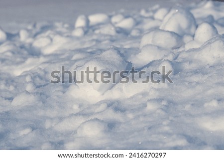 snow balls on a smooth snowy background
