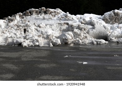 Snow Banks In A Parking Lot