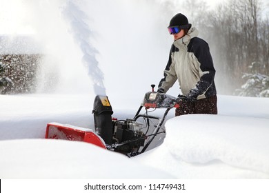 Snow Blowing Man