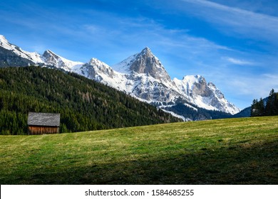 The snow capped "Admonter Kalbling" in the "Kaiserau" mountains near Admont, Styria, Austria with blue sky and light clouds - Powered by Shutterstock