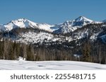 Snow Capped High Mountain Peaks are Backdrops to Wolf Creek Ski Area, Colorado. The San Juan Mountains receive generous amounts of snow, that provides great Winter recreation. 