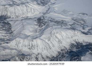 Snow capped mountain range, aerial view, Alpine mountains, peaks - Powered by Shutterstock