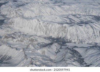 Snow capped mountain range, aerial view, Alpine mountains, peaks - Powered by Shutterstock