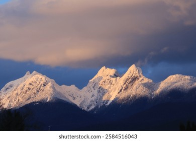 snow capped mountain scape during sunset