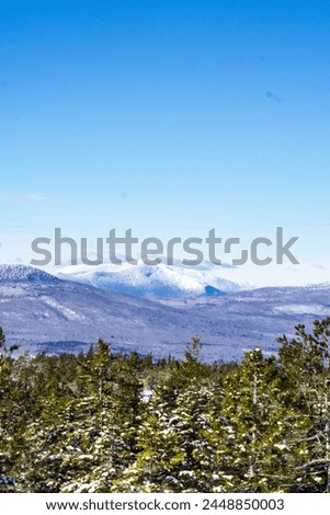 Snow capped mountains on a clear winter day. Rumford Whitecap Mountain. Maine.