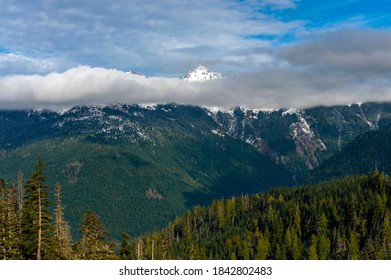 Snow Capped North Cascade Mountain Range. A fresh powdering of snow on the peaks surrounding the Mt. Baker area of western Washington state.