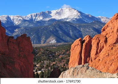 Snow Capped Pikes Peak Soaring Over The Garden Of The Gods Near Colorado Springs, Colorado In Winter