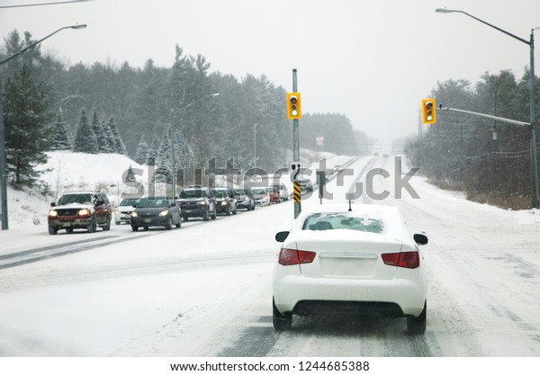 Snow in\
the city. Driving in severe weather\
conditions