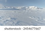 Snow Covered Antarctic Surface Aerial View Flight. South Pole Ice Landscape. Winter Frozen Ground Continent Snowy Frost Rock Epic Drone Fly