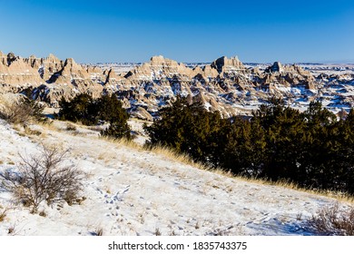 Snow Covered Barren Hills Of Badlands National Park 