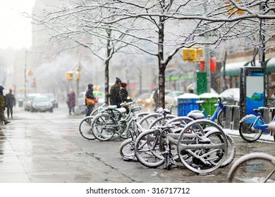 Snow Covered Bicycles After Snowfall In New York, USA