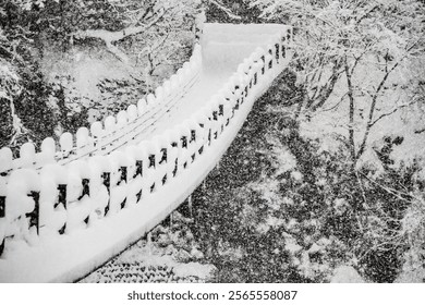 Snow Covered Bridge in a Winter Forest, Shirakawa-go, Japan - Powered by Shutterstock