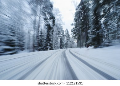 Snow Covered Country Road From Below In Motion Blur