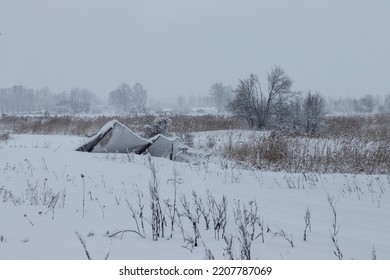 Snow Covered Field, Broken Fallen Metal Fence