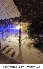 Snow Covered Garden In The Backyard, Winter Night Time.