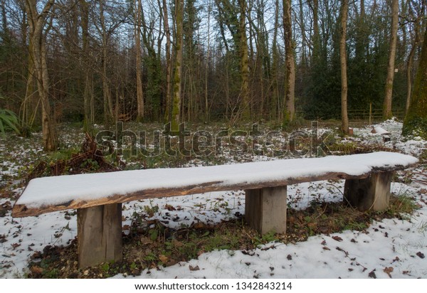 Snow Covered Home Made Wooden Bench Royalty Free Stock Image