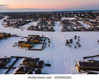 Snow Covered Landscape Above Austin Texas After Winter Storm Uri During Morning Sunrise Over Suburb Homes 