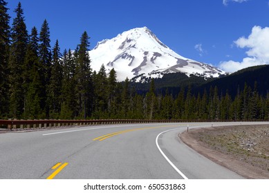 Snow Covered Mount Hood, A Volcano In The Cascade Mountains In Oregon Popular For Hiking, Climbing, Snowboarding And Skiing, Despite The Risks Of Avalanche, Crevasses And Volatile Weather On The Peak.