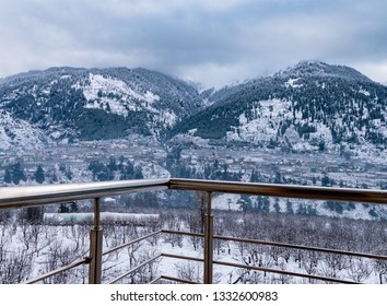 Snow Covered Mountain Against Cloudy Sky From A Balcony Of A Hotel In Manali, India