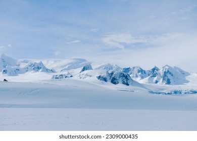 snow covered mountains in Antarctica - Powered by Shutterstock
