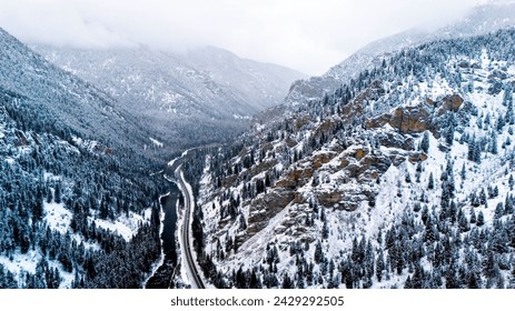 Snow covered mountains canyon through the river road aerial view - Powered by Shutterstock