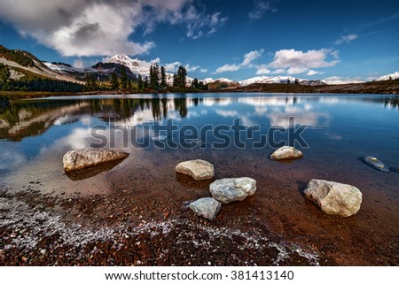 Similar – Panorama of Mount Rundle mountain peak with blue sky