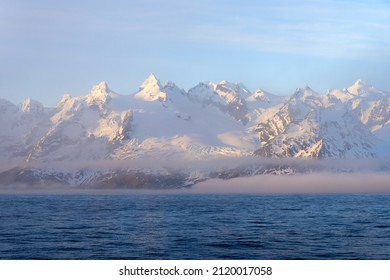 Snow Covered Mountains On South Georgia West Coast, South Georgia And The Sandwich Islands, Antarctica