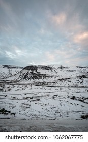 snow covered mountains and valleys