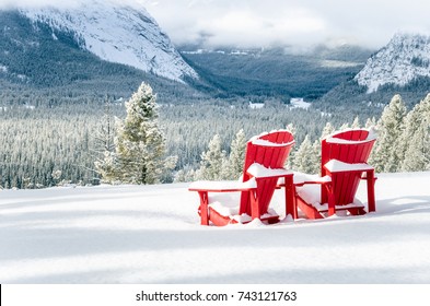 Snow Covered Red Adirondack Chairs Facing Stock Photo 743121763