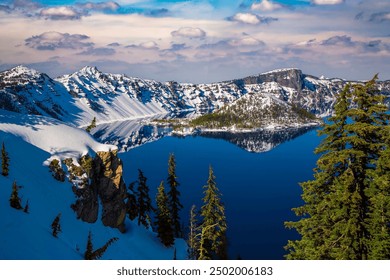 Snow covered rim of Crater Lake and Wizzard Island in Crater Lake National Park, Oregon. - Powered by Shutterstock