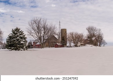 The Snow Covered Rural Farm Scene In Northern, Illinois.