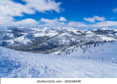 Snow Covered Slopes Of The Sierra Nevada Mountains In Lake Tahoe Near A Ski Resort In Winter