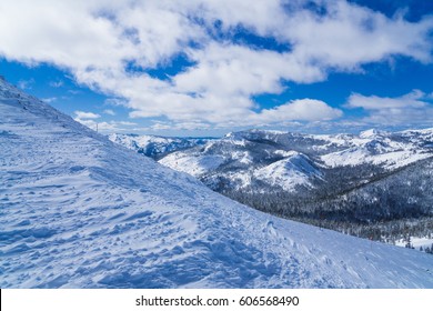 Snow Covered Slopes Of The Sierra Nevada Mountains In Lake Tahoe Near A Ski Resort In Winter