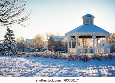 Snow Covered Suburban Village Lit By Morning Light In Columbus, Ohio -- December 14, 2016