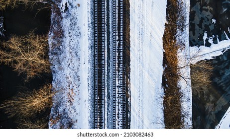 Snow Covered Train Tracks Aerial Top Down View