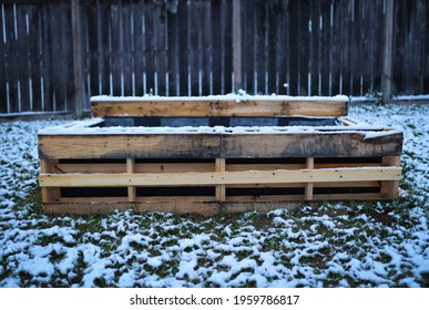 Snow Covered Vegetable Garden Bed Maid Out Of Old Shipping Pallets