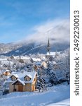 The snow covered village of Saint-Leger-les-Melezes in the Champsaur Valley of Hautes-Alpes in winter. Ski resort in the Ecrins National Park, French Alps, France