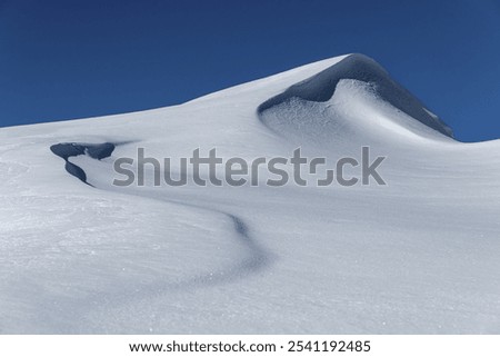 Snow drift with snow cornice, snow surface with structures with light and shade, Rietzlern, Kleinwalsertal, Vorarlberg, Austria, Europe