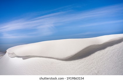 Snow Drifts And Blue Sky.