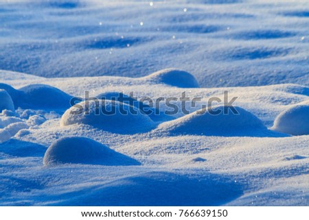 snow drifts with convex hills, winter, frosty day