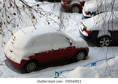 Snow Drifts On The Roof Of The Car.