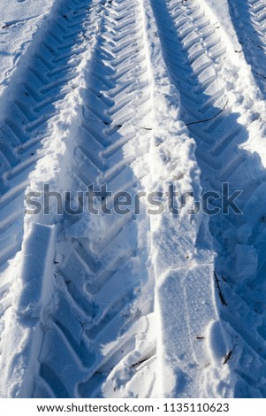 Similar – snow tracks Winter Ice