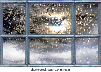 Snow Falling Outside The Window