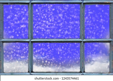 Snow Falling Outside The Window