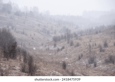 Snow fog and fine snow in late autumn - Powered by Shutterstock