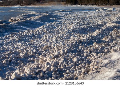 Snow, Frost And Wind Create Irregularly Shaped Ice Balls On The Shores Of Lake Michigan