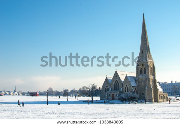 Snow fun at the All Saints Church in Blackheath\
Common. The wintry weather was caused by the “beast from the east”\
- a rare and prolonged spell of cold weather. London, England –\
February 28, 2018