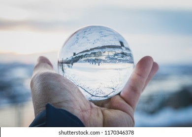 Snow Globe In Hands