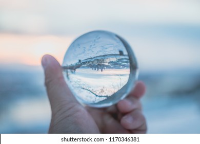 Snow Globe In Hands