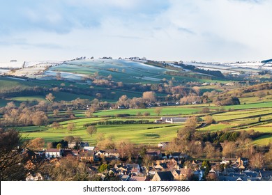 Snow And Green Grass On Colourful Shropshire Hills, View Over Clun In December For Christmas. Photo Of A Beautiful Hilly British Landscape In UK